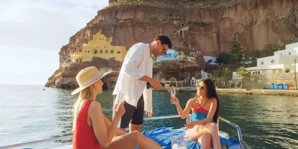 Welcome drinks served on board during a Vista Yachting private cruise