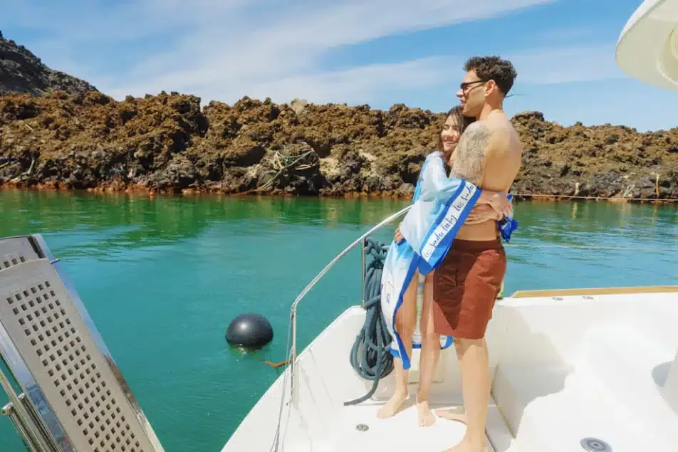 Santorini hot springs swimming stop during a Vista Yachting private cruise