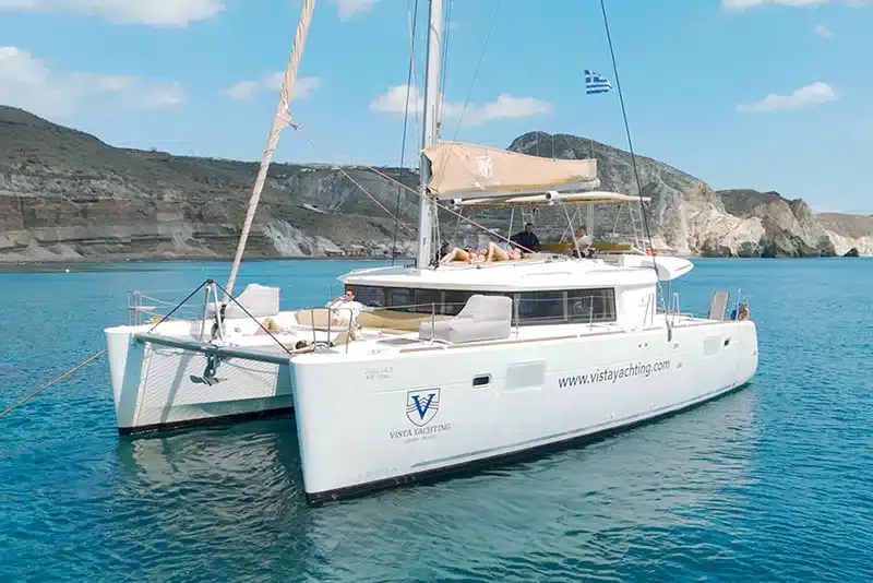 Swimming at Santorini volcanic hot springs during catamaran tour